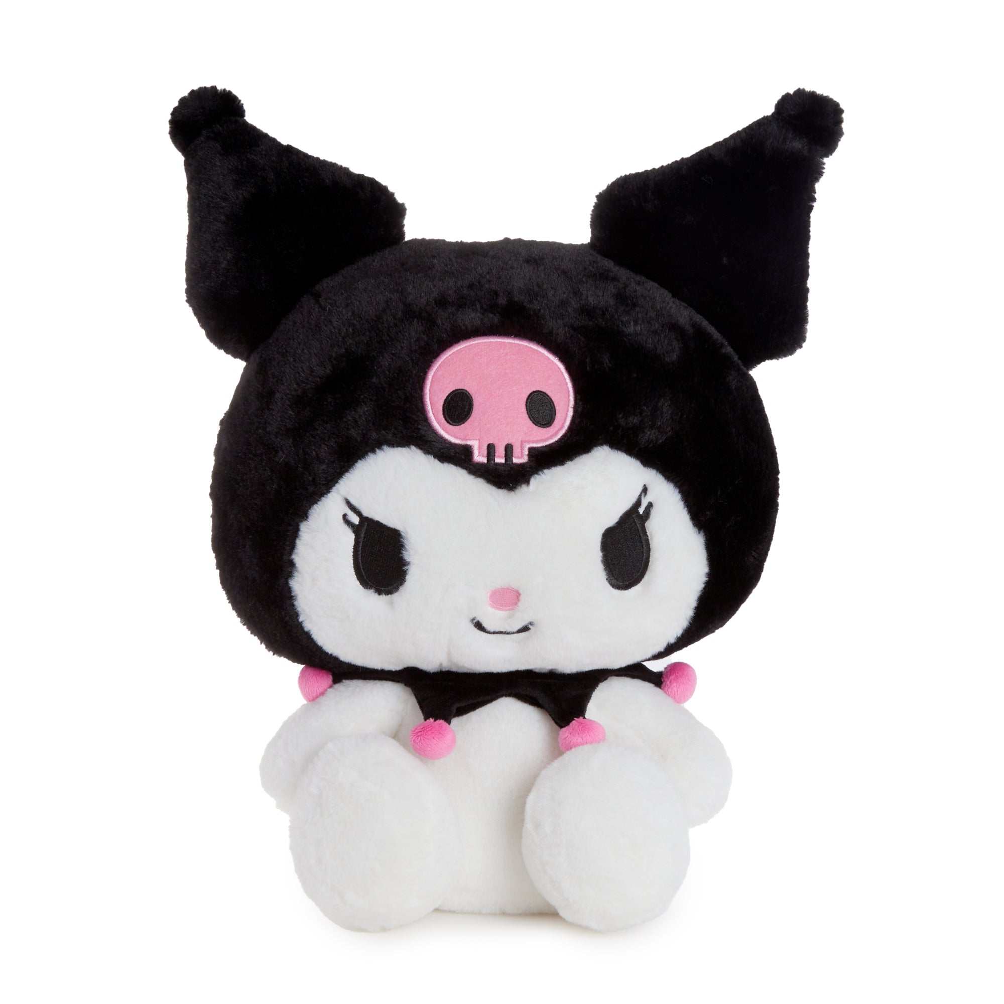 Kuromi plush displayed on a cozy bedroom shelf alongside other cute stuffed animals