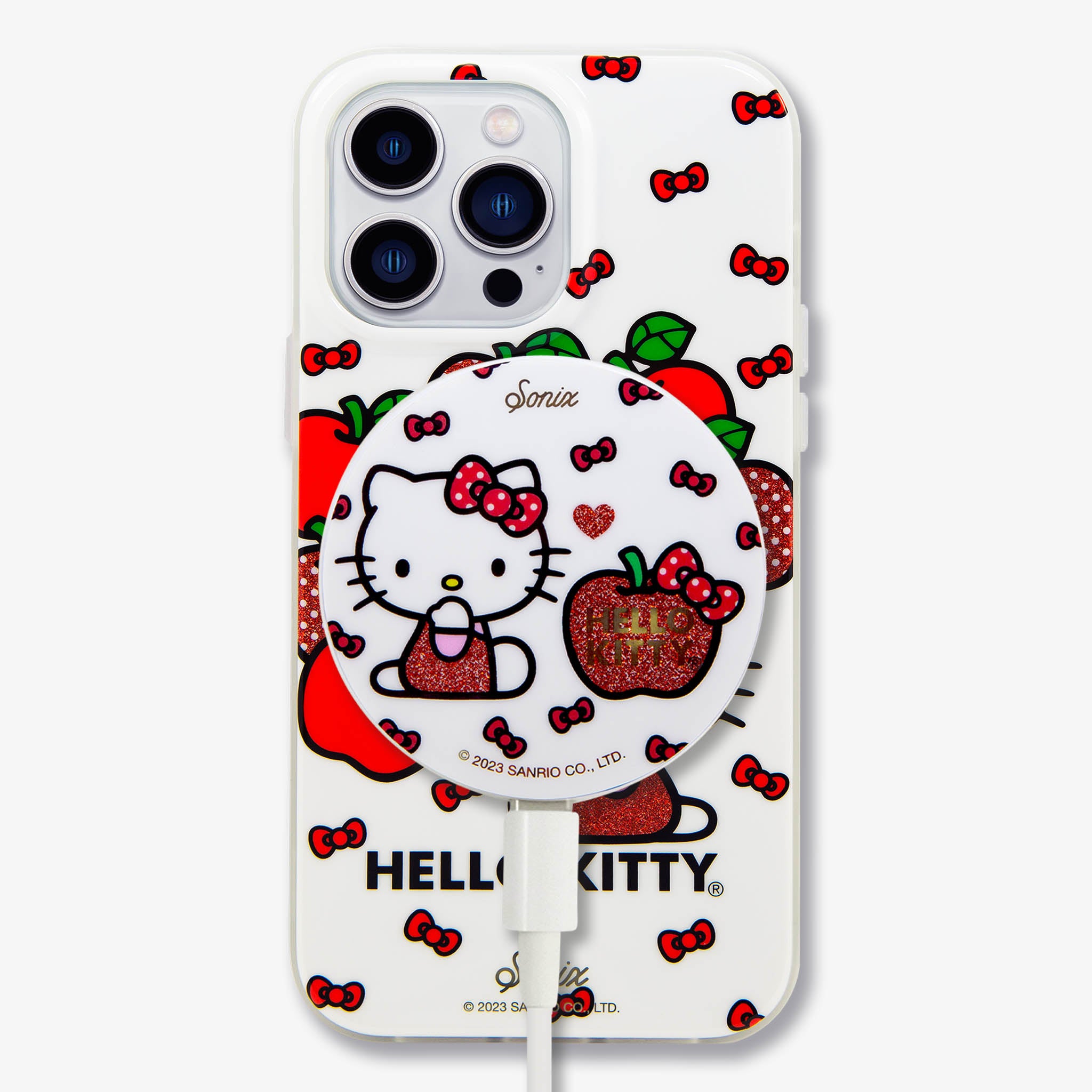 Close-up of Hello Kitty Magnetic Wireless Charger on a desk.