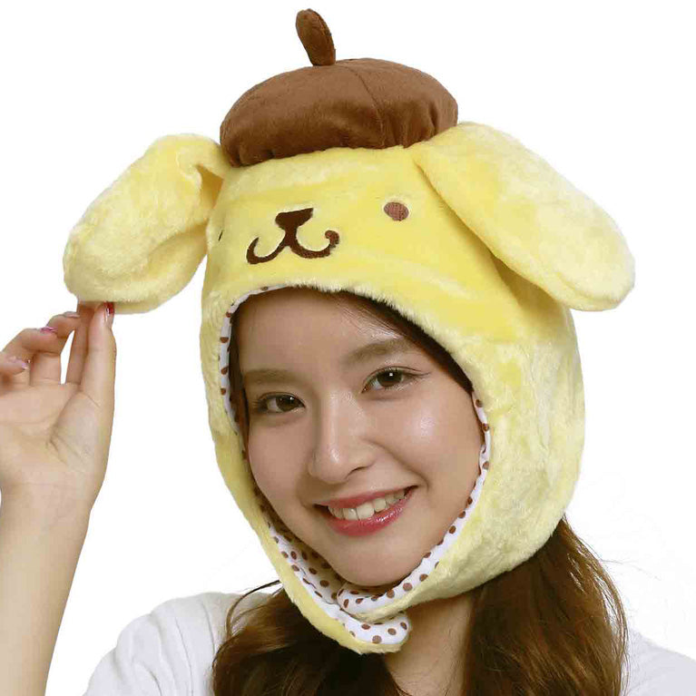Front view of Pompompurin plush hat on a model at a costume party.