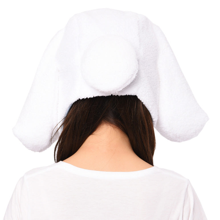 Cinnamoroll Kigurumi Hat on a shelf, next to a Cat in the Hat plush toy, comparing the two cute accessories