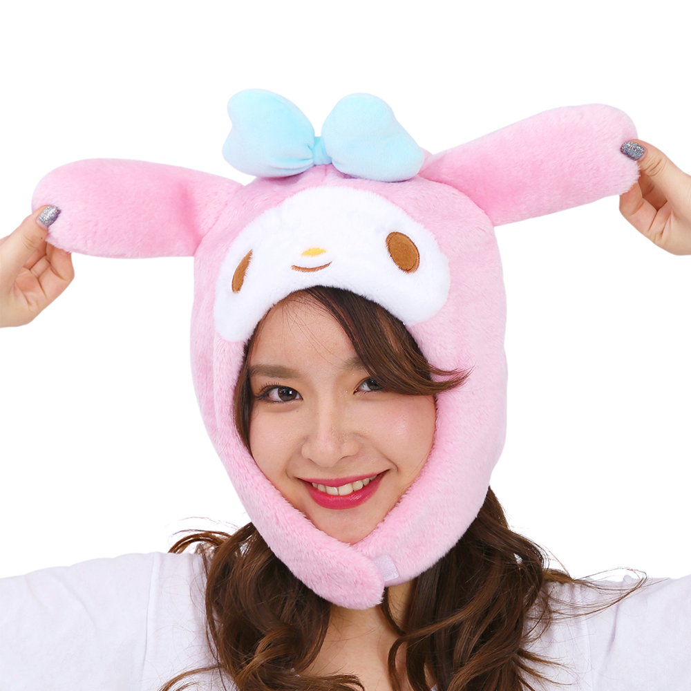 My Melody plush hat worn by a smiling model at a party