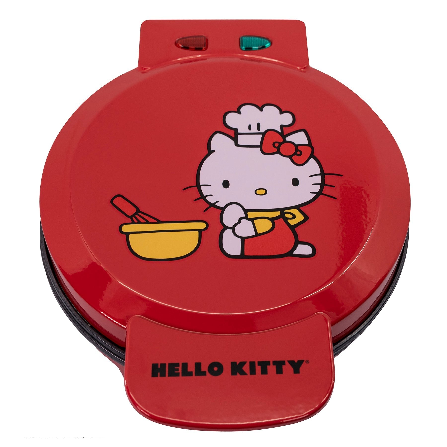 Hello Kitty waffle maker with freshly cooked waffles on a plate.