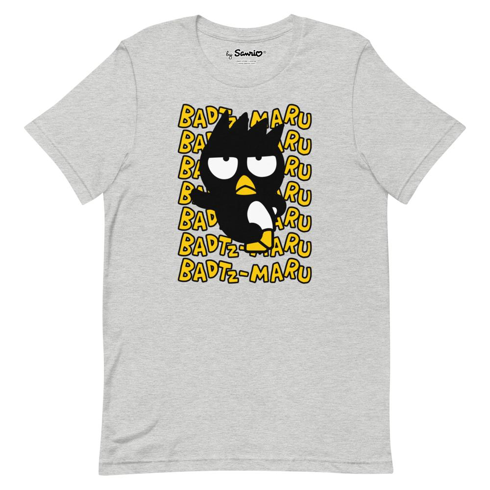 Front view of Badtz-Maru black graphic tee on a model in an urban setting.