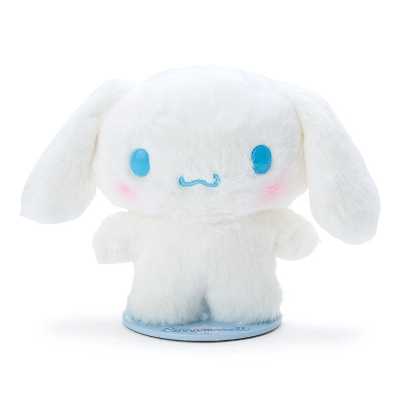 Front view of standing plush toys on desk, featuring Cinnamoroll and mocha plush Sanrio characters.