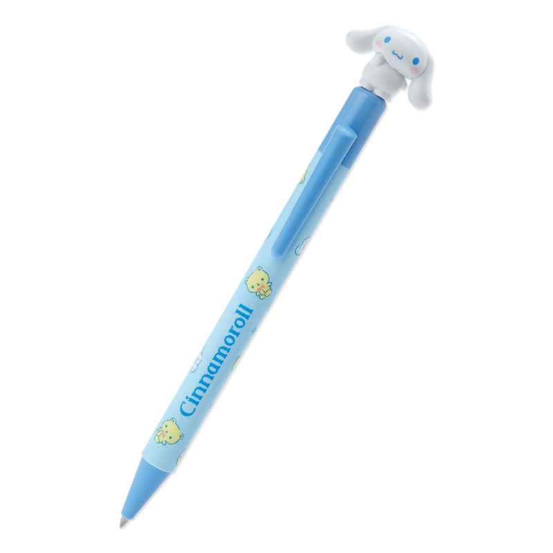 Cinnamoroll ballpoint pen in use, writing on a notebook