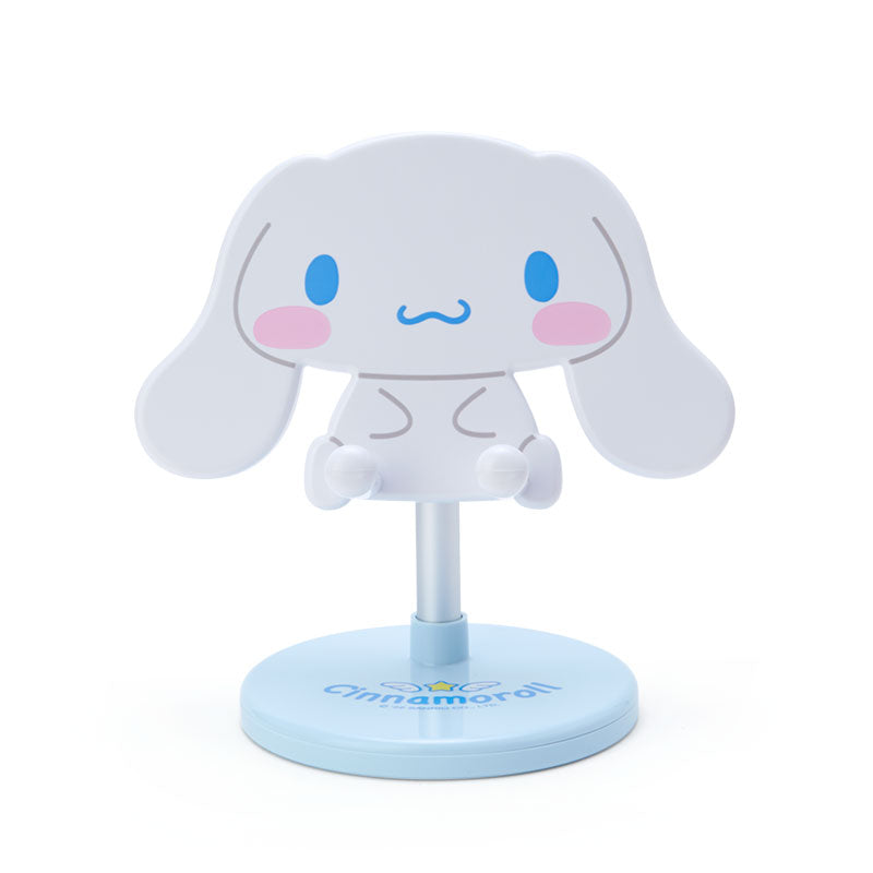 Cinnamoroll phone stand holding an iPhone during a FaceTime call