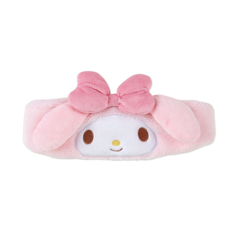 My Melody makeup headband bow being worn during a makeup routine