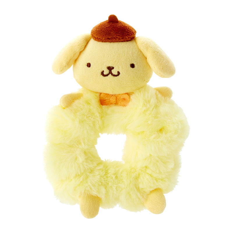 Close-up of Fluffy Pompompurin plush scrunchie showcasing bowtie detail.