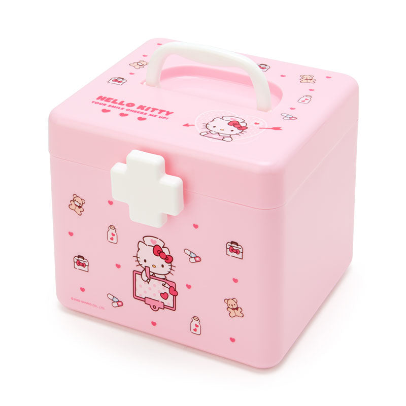 Hello Kitty first aid kit with internal tray pulled out, showing various compartments
