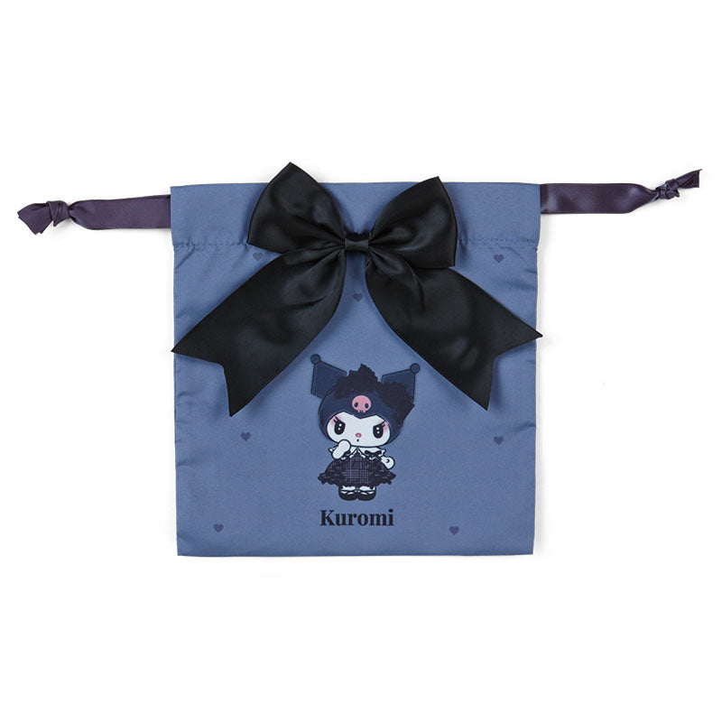 Kuromi bag displayed on vanity table with makeup brushes