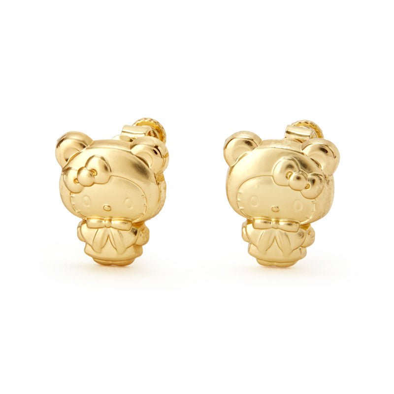 Hello Kitty gold earrings displayed on a velvet jewelry tray