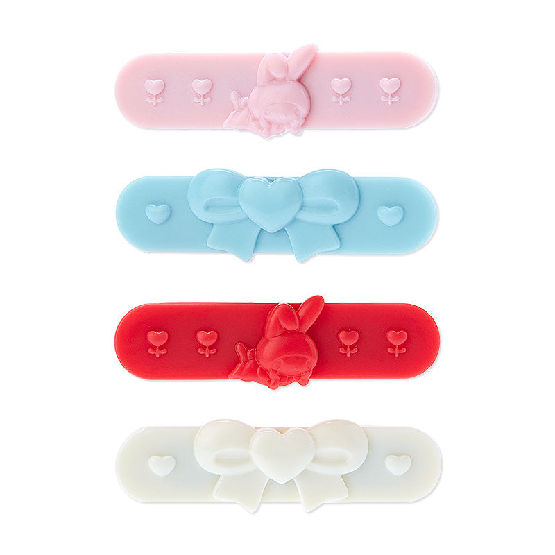 My Melody mini hair clips set, showcasing four different colorful designs